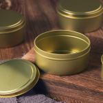 How can I design candle tins that can be quickly and cleanly filled and capped?